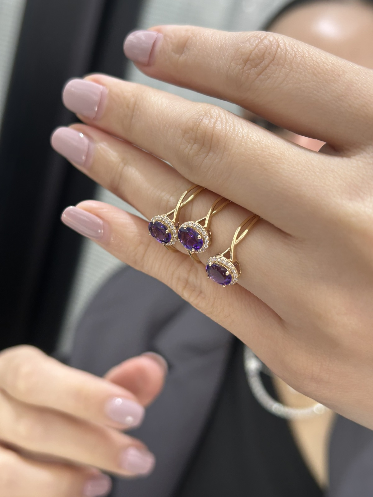 Oval Cut Halo Amethyst Interlocking Bond Ring